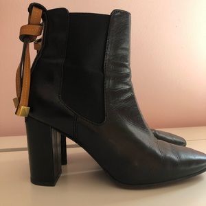 Stuart Weitzman black boots with brown tassel sz8